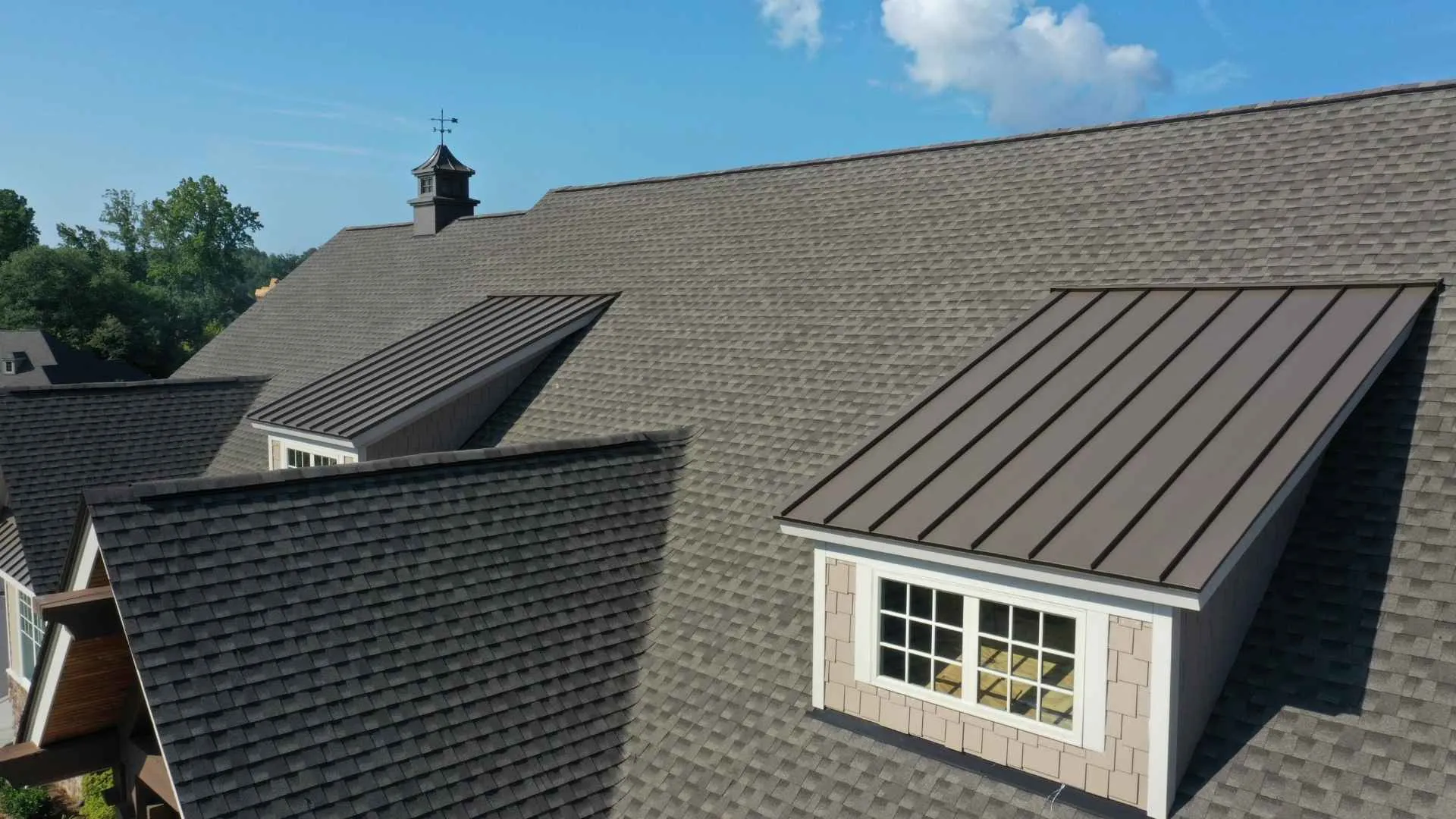 Finished residential roof showing modern shingle material detail